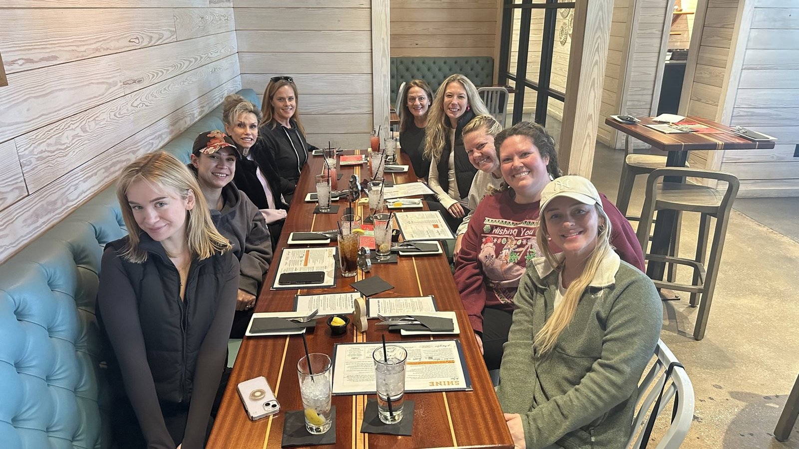 A Pilates pairing dinner around a long table