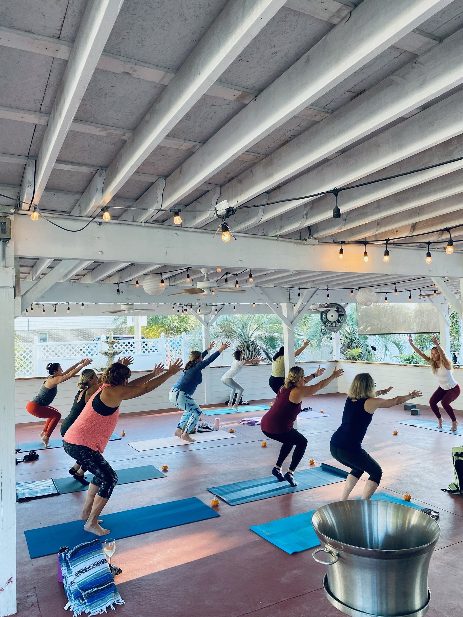 A pop-up class under string lights